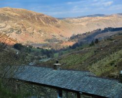 Hostel roof with Ullswater and Place fell in the distance