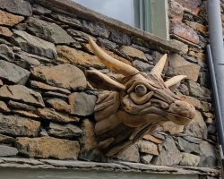 Cow head sculpture overlooking the outside space